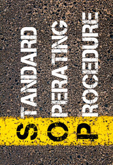Business Acronym SOP as Standard Operating Procedure.
Yellow paint line on the road against asphalt background. Conceptual image